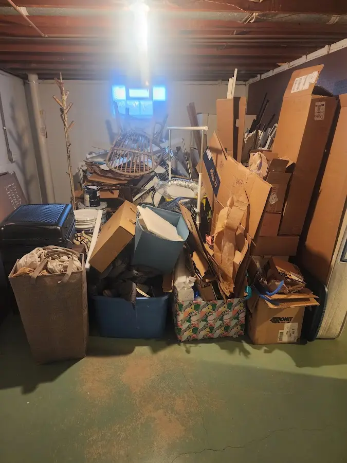 Roll-off dumpster container at job site for 15 Yard Dumpster Rental in Inkster